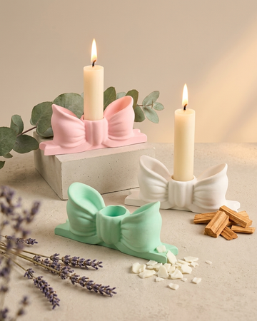 Concrete gypsum bow shaped taper candle holder India elegant gifting home decor wholesale