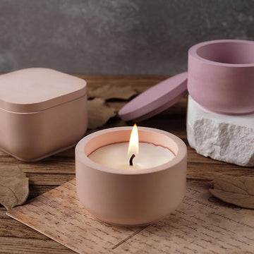 "Ribbed small jar candle in a sleek reusable concrete and ceramic jar, hand-poured with pure soy wax for eco-friendly elegance."